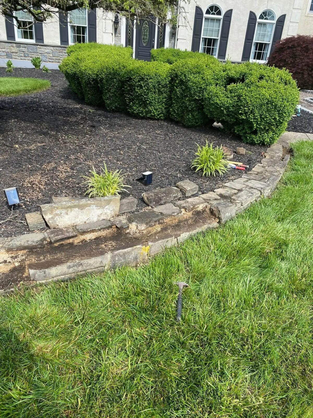 Stone edging and garden bed hardscaping