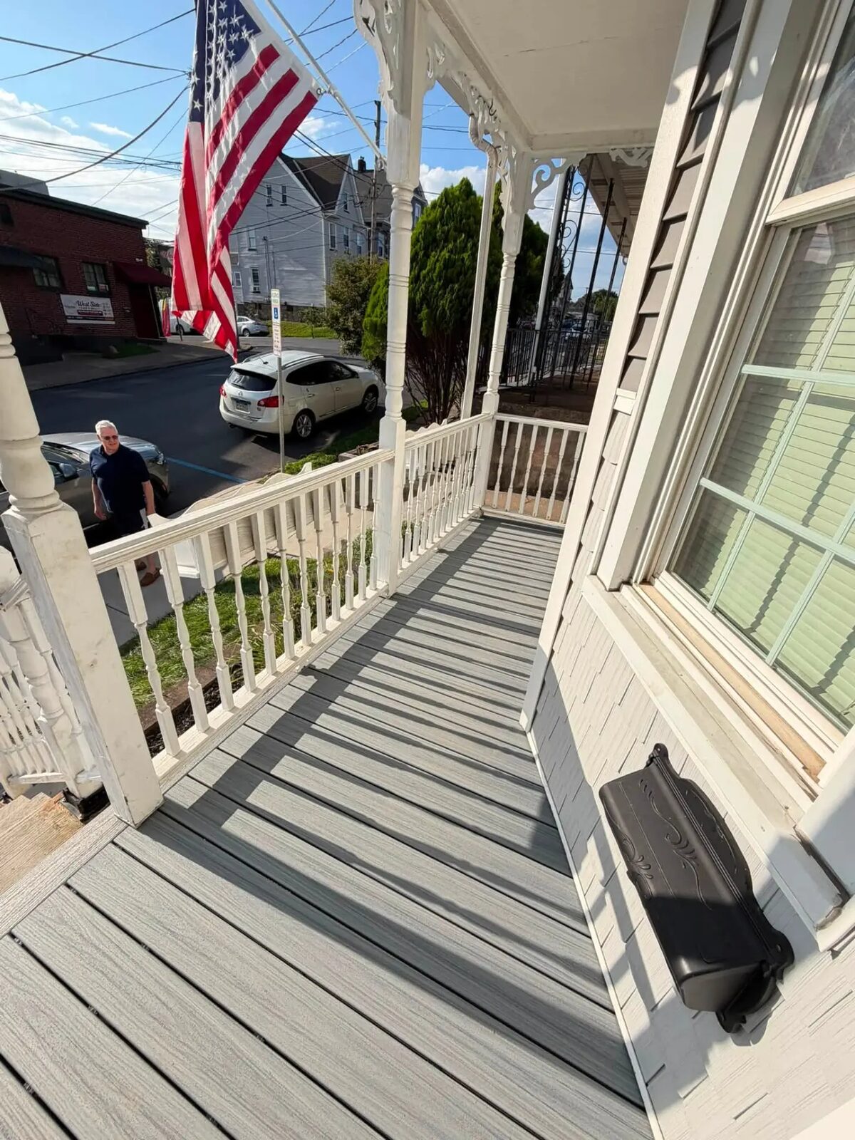 Rebuilt Victorian front porch with composite decking